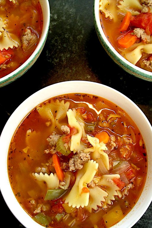 three bowls of pasta-sausage soup