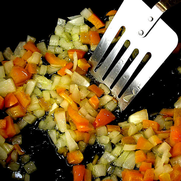 Sauteeing the vegetables for refried beans